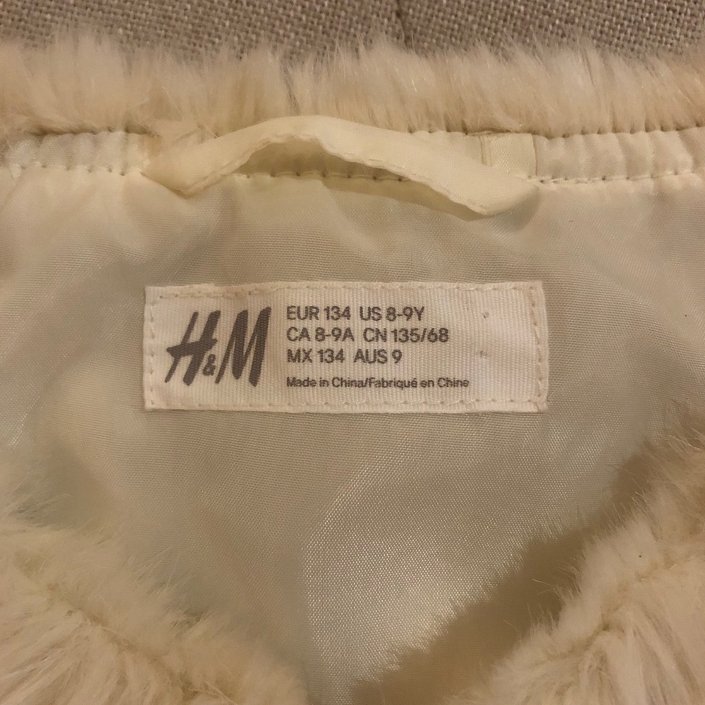 Ivory faux fur vest